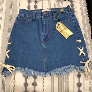 Denim Jean skirt with crosses on the side